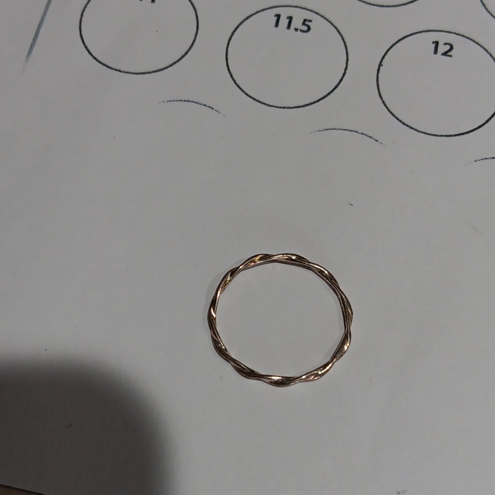 Four Faux Silver Rings - Picture 5 of 5